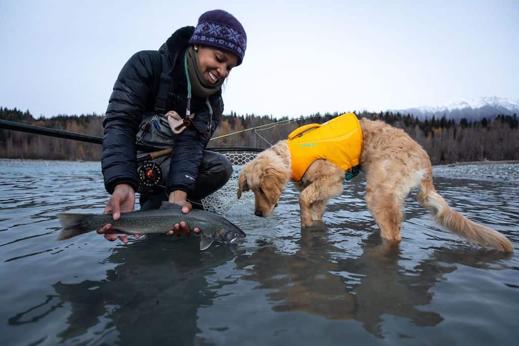Ruffwear Float Coat on a puppy fishing