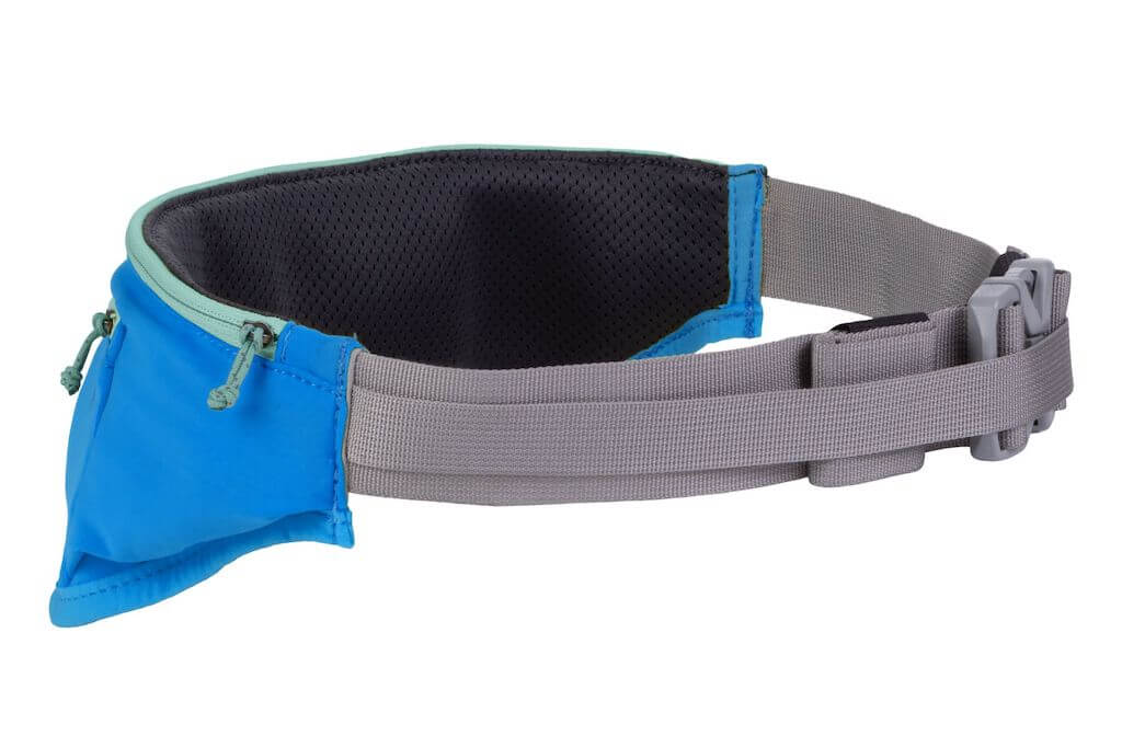 Ruffwear Trail Runner hip belt in 'Blue Pool' colour that allows you to attach a leash. It has zippered pockets.  Designed for hands-free dog walking or running.