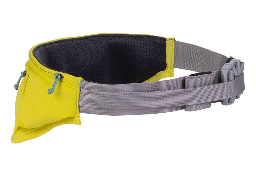 Ruffwear Trail Runner hip belt in 'Blue Pool' colour that allows you to attach a leash. It has zippered pockets.  Designed for hands-free dog walking or running.