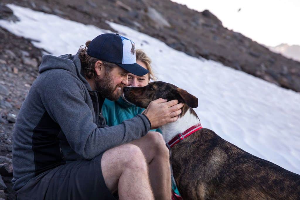 Ruffwear Red Crag Collar lifestyle shot with happy dog and man 