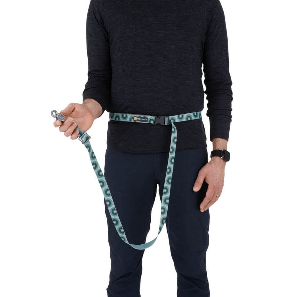 Ruffwear Crag EX Adjustable Dog Leash Showing it around a man's waist